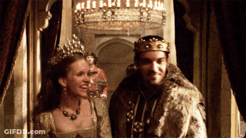 Man In Crown And Woman In Tiara GIF