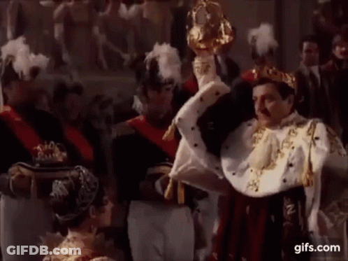 Man In Crown Holding Trophy GIF