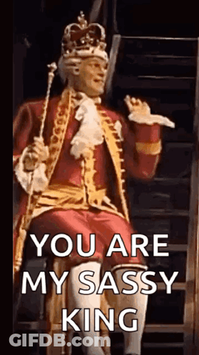 Man In Crown Sitting On Throne Holding Cane And Sword GIF