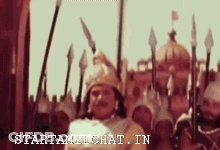 Man In Crown Standing Before Crowd GIF