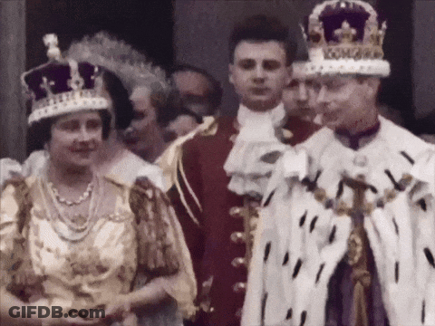 Man In Crown With King Text Next To Woman GIF