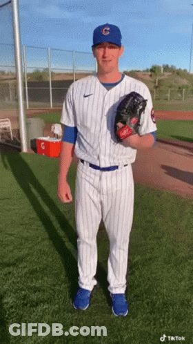 Man In Cubs Uniform Holding Baseball Glove GIF