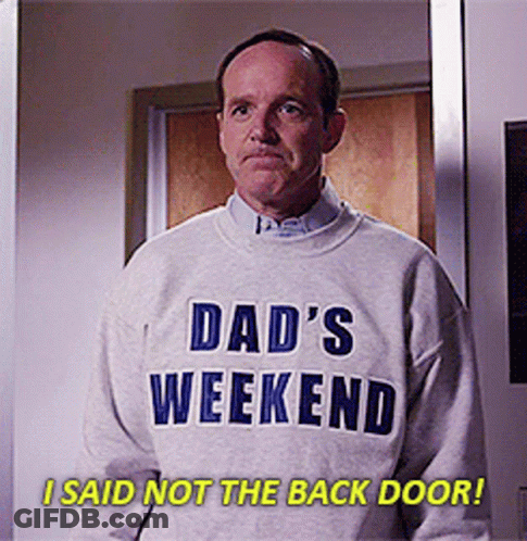 Man In Dad's Weekend Sweater In Front Of Door GIF