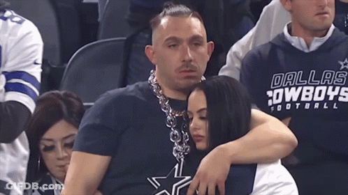 Man In Dallas Cowboys Shirt Hugging Woman GIF