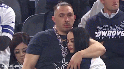 Man In Dallas Cowboys Shirt Hugging Woman GIF