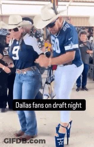 Man In Dallas Jersey Dancing With Woman In Cowboy Boots GIF
