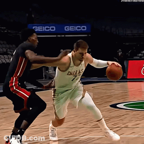 Man In Dallas Jersey Dribbling Ball GIF