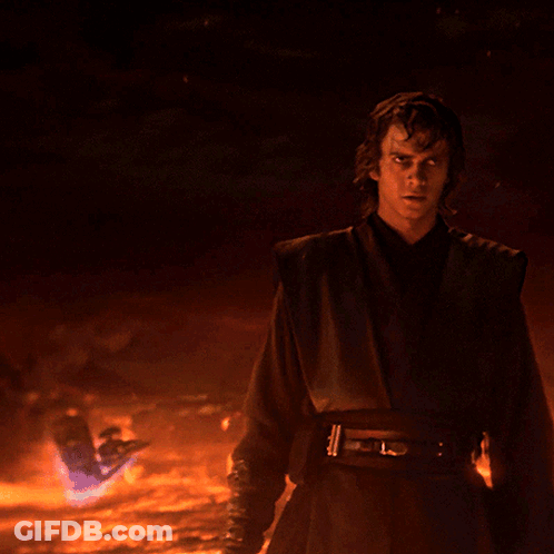 Man In Dark Costume With L Belt GIF