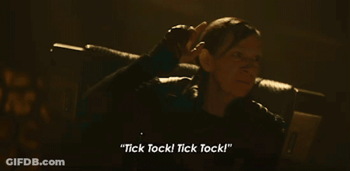 Man In Dark Room Goes The Ancient Clock GIF