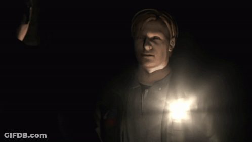 Man In Dark Room Holding Flashlight GIF