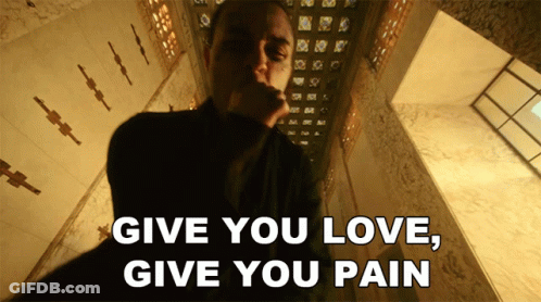 Man In Dark Room Saying Give You Love Give You Pain GIF