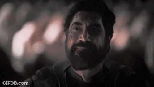 Man In Dark Room Saying Holy Shit You Are An Alien GIF