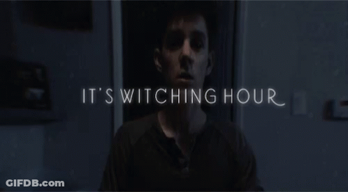 Man In Dark Room Saying It's Switching Hour GIF