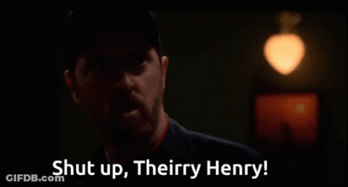 Man In Dark Room Saying Shut Up Theirry Henry GIF
