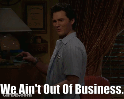 Man In Dark Room Saying We Ain't Out Of Business GIF