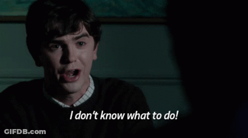 Man In Dark Room Says I Don't Know What To Do GIF