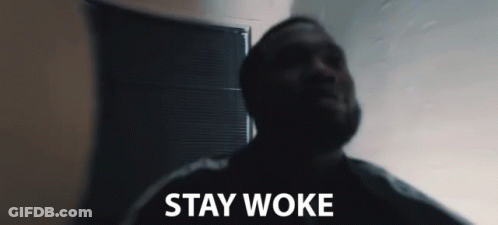 Man In Dark Room Stay Woke GIF
