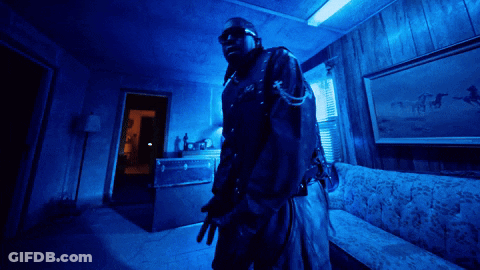 Man In Dark Room With Blue Light GIF