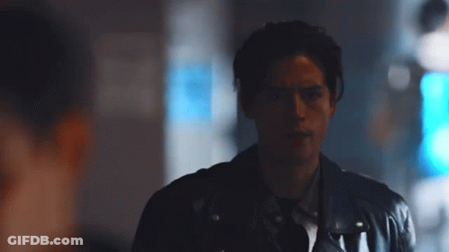 Man In Dark Room With Blue Light GIF