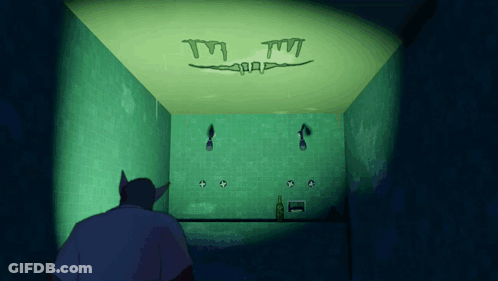 Man In Dark Room With Glowing TM Sign GIF