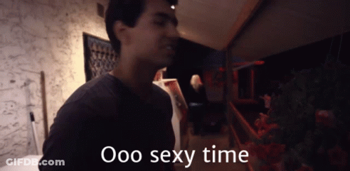 Man In Dark Room With Ooo Sexy Time GIF