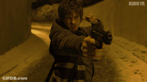 Man In Dark Room With Resident Evil GIF