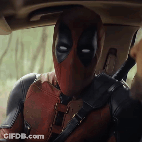 Man In Deadpool Suit Sitting In Car GIF