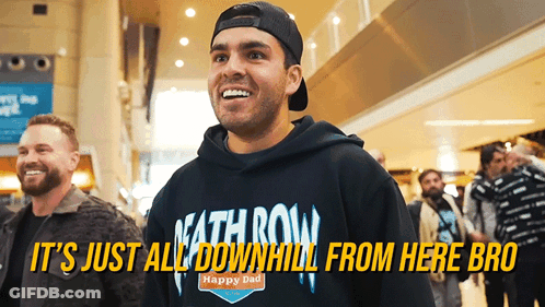 Man In Death Row Hoodie In Crowd GIF