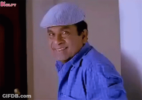 Man In Delta Force Headband Sitting With Hand On Chin GIF