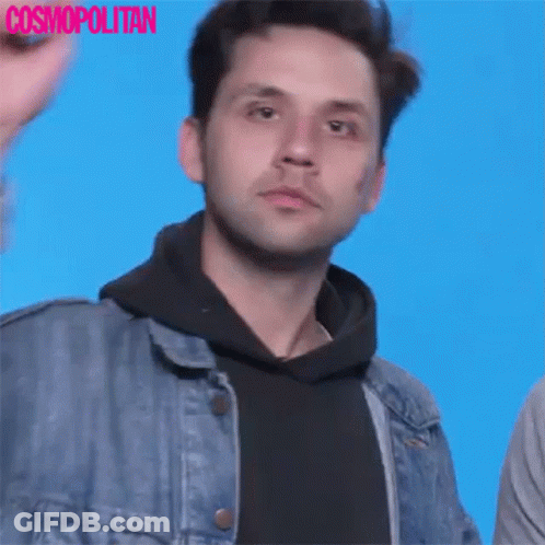 Man In Denim Jacket And Black Hoodie Waving GIF