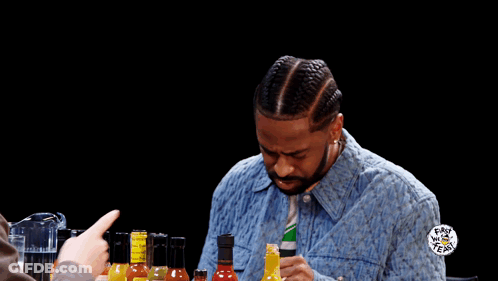 Man In Denim Jacket And Jamaica Shirt GIF