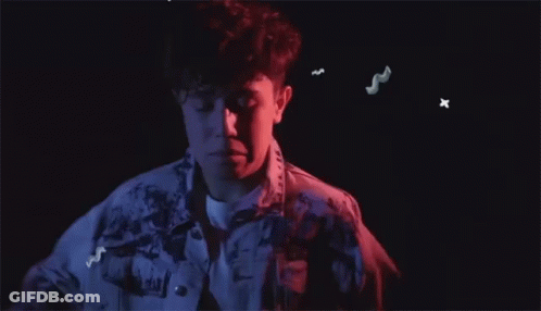 Man In Denim Jacket, Blue And Red Light GIF