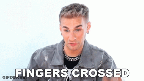 Man In Denim Jacket Crosses Fingers GIF