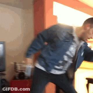 Man In Denim Jacket Dancing GIF