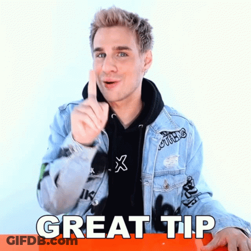 Man In Denim Jacket Giving Thumbs Up Saying Great Tip GIF