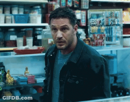 Man In Denim Jacket Looking In Store GIF