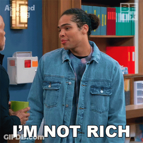 Man In Denim Jacket Saying I'm Not Rich GIF