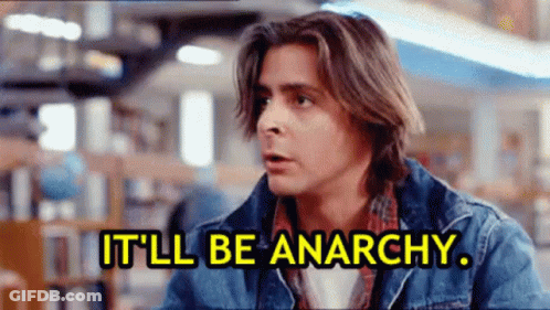 Man In Denim Jacket Saying It'll Be Anarchy GIF