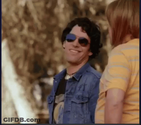 Man In Denim Jacket Smiling And Talking GIF