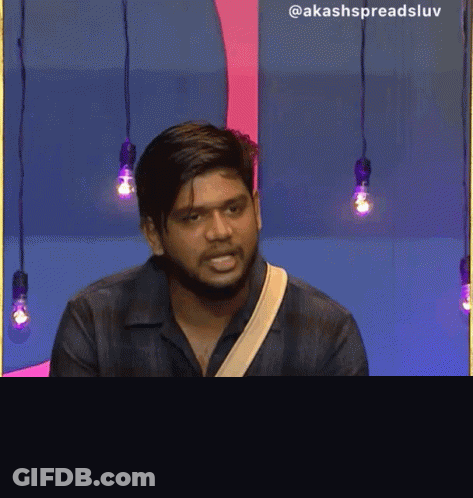 Man In Denim Shirt With Akash Spreadsluv Strap GIF