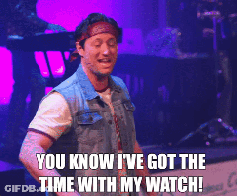 Man In Denim Vest And Headband Saying I Have The Time GIF