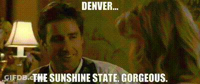 Man In Denver Jersey Flexing Muscles In Front Of Broncos Poster GIF