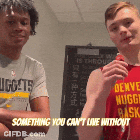 Man In Denver Nuggets Shirt Beside Another Man GIF
