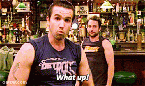 Man In Detroit Shirt Saying What Up In Bar GIF