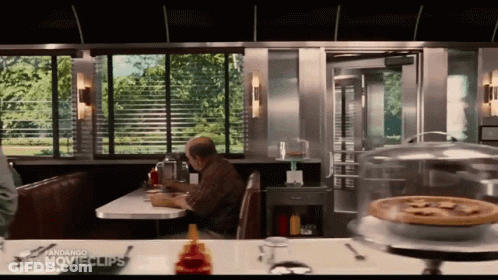 Man In Diner With Pie GIF