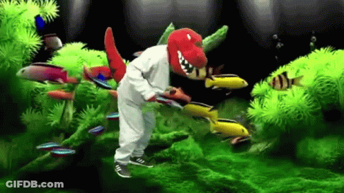 Man In Dinosaur Costume In Aquarium GIF