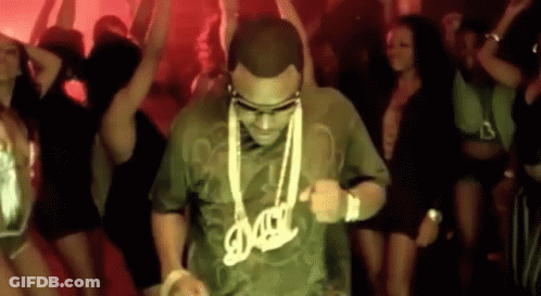Man In DMC Shirt Dancing In Crowd GIF
