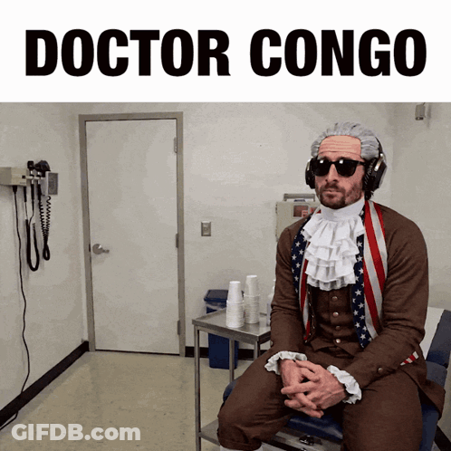 Man In Doctor Congo Costume Sitting On Chair GIF