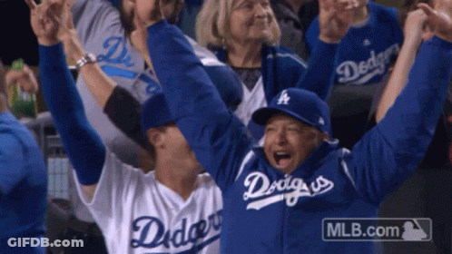 Man In Dodgers Jersey Holding Arms Up GIF
