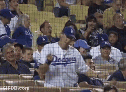 Man In Dodgers Jersey In Crowd GIF